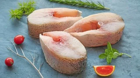 Portion Cut of Fresh Fish Stock Photos