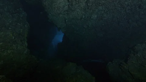 Portion of dark sea seen from inside a cave,Ustica, Mediterranean sea Stock Footage 125141832