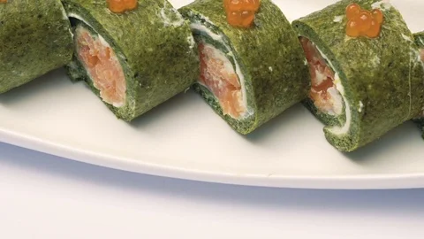 Portion of delicious caviar sushi Video stock 71028329