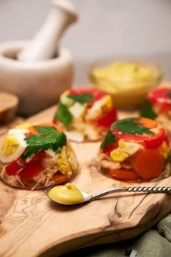 Portion of delicious chicken aspic on serving board on concrete table Stock Photos