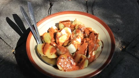 Portion of delicious somay covered in peanut sauce is ready to eatt Stock Footage 287754172