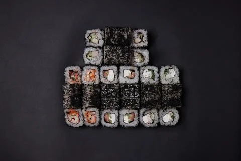 A portion of different rolls on the table, japanese food, sushi set on marble Stock Photos