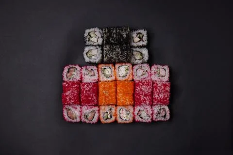 A portion of different rolls on the table, japanese food, sushi set on marble Stock Photos