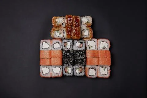 A portion of different rolls on the table, japanese food, sushi set on marble Stock Photos