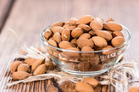 Portion of dried almonds Stock Photos