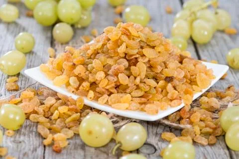 Portion of dried grapes Stock Photos