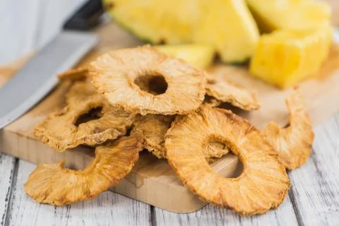 Portion of Dried Pineapple Rings, selective focus Stock Photos