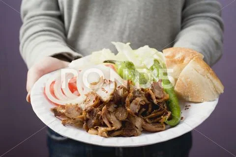 A portion of dšner kebab Stock Photos