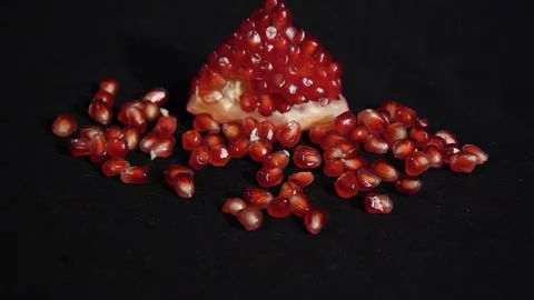 Portion of fresh made pomegranate. Fresh red pomegranate seeds isolated on a Video stock 106205095