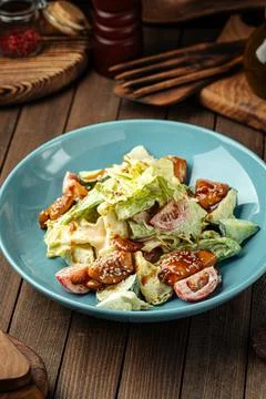 Portion of fresh mixed salad with fried chicken Stock Photos