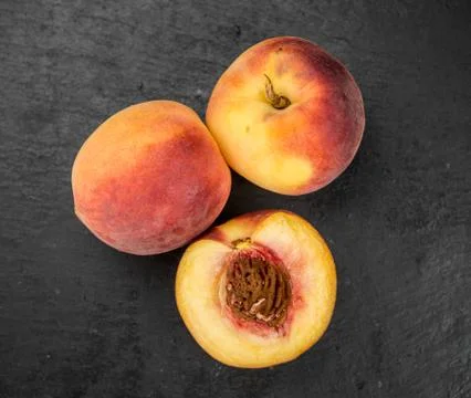 Portion of Fresh Peaches, selective focus Stock Photos