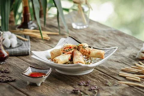 Portion of fried asian spring rolls Stock Photos