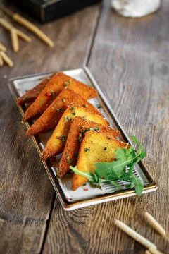 Portion of fried egg croutons Stock Photos