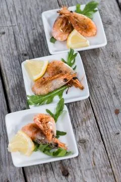 Portion of fried prawns Stock Photos