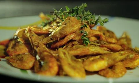 Portion of fried shrimps Stock Photos