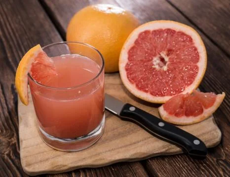 Portion of grapefruit juice Stock Photos