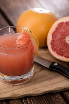 Portion of grapefruit juice Stock Photos