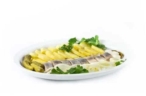Portion of herring fish fillets with potato Stock Photos