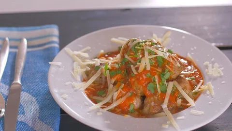 A portion of home-made meatballs with tomato sauce and parmesan cheese Stock Footage 112174994