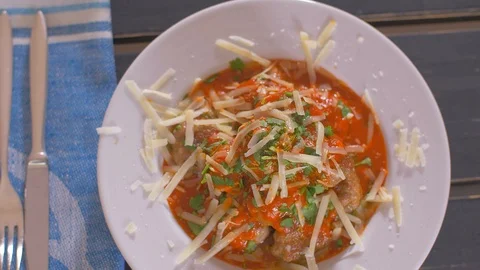 A portion of home-made meatballs with tomato sauce and parmesan cheese Stock Footage 112177435