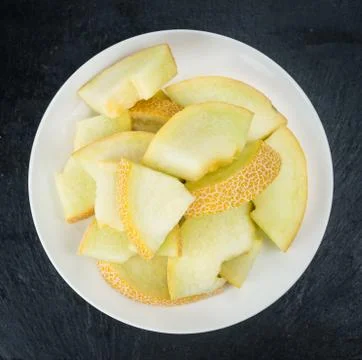 Portion of Honeydew Melon (selective focus) Stock Photos