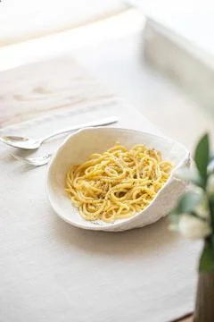 Portion of italian cacio e pepe pasta Stock Photos