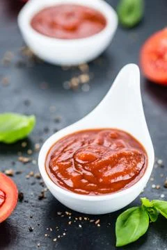 Portion of Ketchup (selective focus) Stock Photos