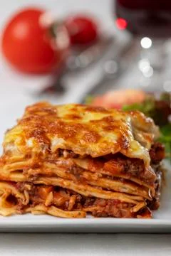 Portion of lasagna on a plate Stock Photos