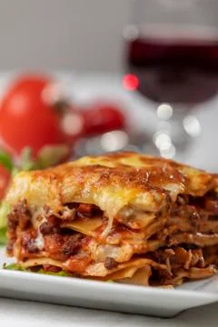 Portion of lasagna on a plate Stock Photos
