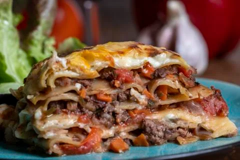 Portion of lasagna on a plate Stock Photos