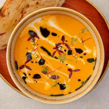 Portion of lentil soup with toasted bread Stock Photos
