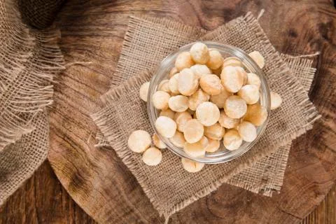 Portion of macadamia nuts Stock Photos