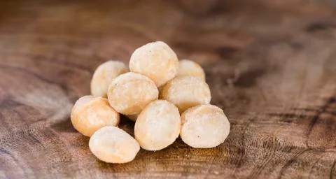 Portion of macadamia nuts Stock Photos