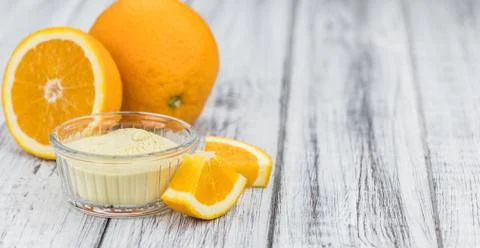 Portion of Orange fruit Powder (selective focus) Stock Photos