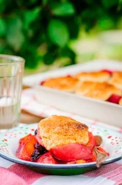 A Portion of Peach and Black Raspberry Cobbler Stock Photos