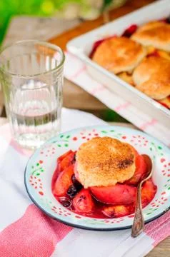 A Portion of Peach and Black Raspberry Cobbler Stock Photos