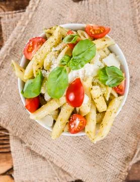 Portion of penne with basil pesto Stock Photos