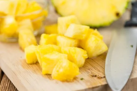 Portion of Pineapple (sliced), selective focus Stock Photos