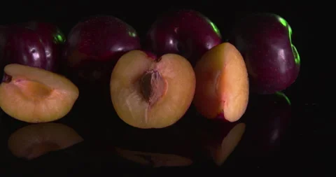 Portion Of Plums in a studio shot Stock Footage 243246754