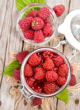 Portion of preserved raspberries Stock Photos