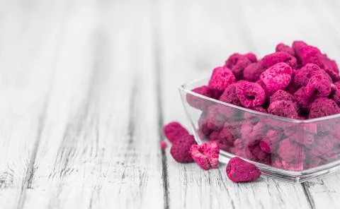 Portion of Raspberries (dried), selective focus Stock Photos