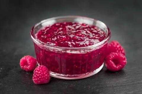 Portion of Raspberry Jam on a slate slab Stock Photos