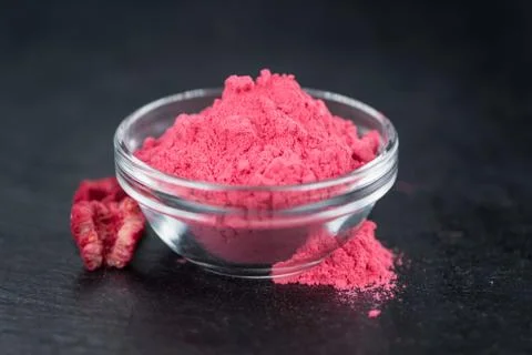 Portion of Raspberry powder on a slate slab Stock Photos