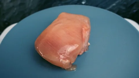 Portion of raw chickhen breast 動画素材 107734225