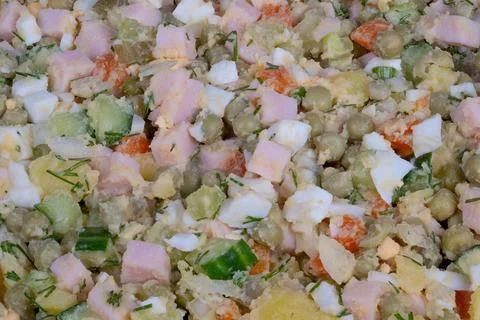 Portion ready olivier salad with ham meal prep scene, home cook packing conta Stock Photos