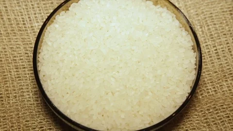 Portion of rice in a bowl, close-up, with rotation Stock Footage 71962745