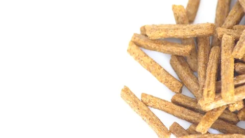 Portion of rotating Bread Chips as seamless loopable 4K UHD footage Video stock 88555893