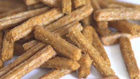 Portion of rotating Bread Chips as seamless loopable 4K UHD footage Stock Footage 88614506
