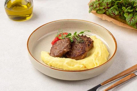 Portion of russian beef cutlets with mashed potato Stock Photos