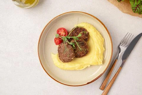 Portion of russian beef cutlets with mashed potato Stock Photos